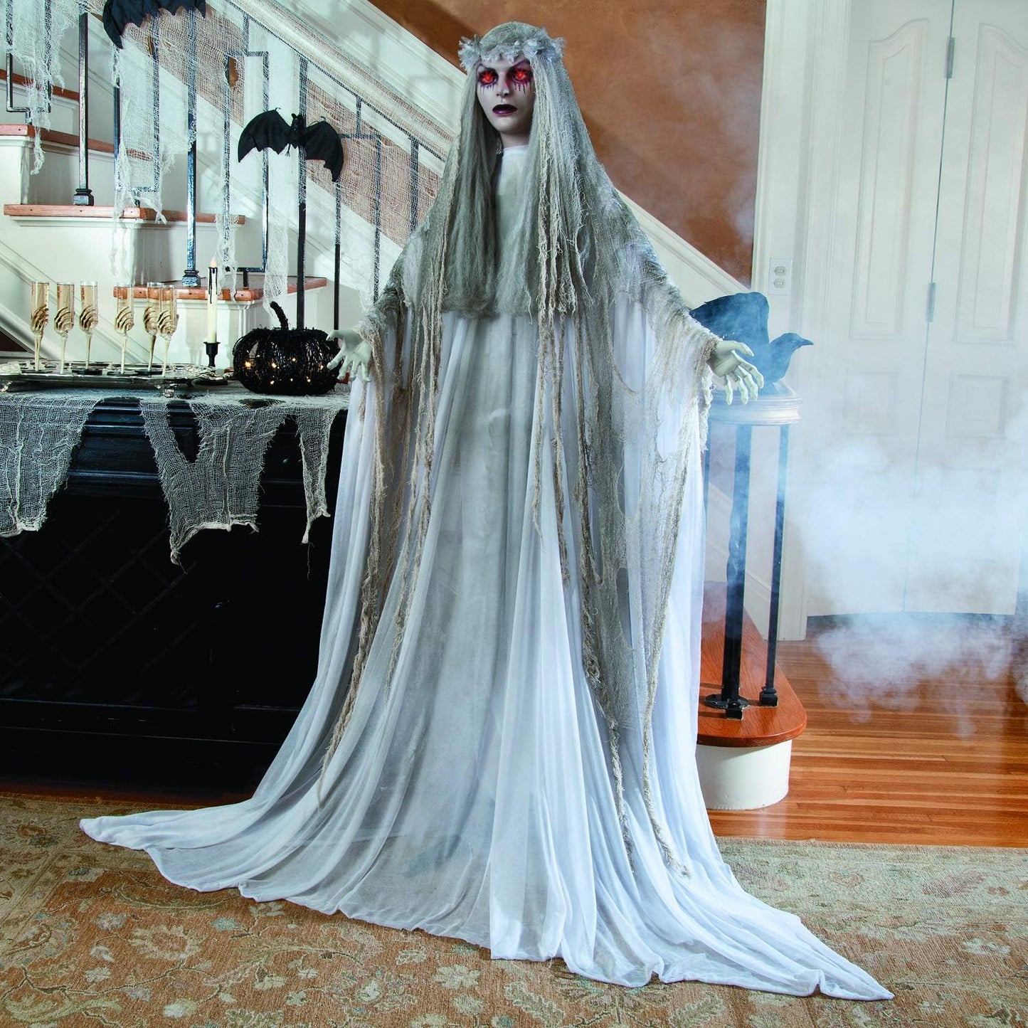 Fun Express Standing Ghost Girl Halloween Decoration, 5 feet 7 inch, Plastic and Metal, Flashing Red Eyes with Tatterered Gown, Great for Indoor, Outdoor and Porch Halloween Spooky Decor - White