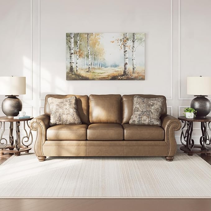 Signature Design by Ashley Shadsburne Rustic Faux Leather Sofa with Nailhead Trim and 2 Throw Pillows, Brown