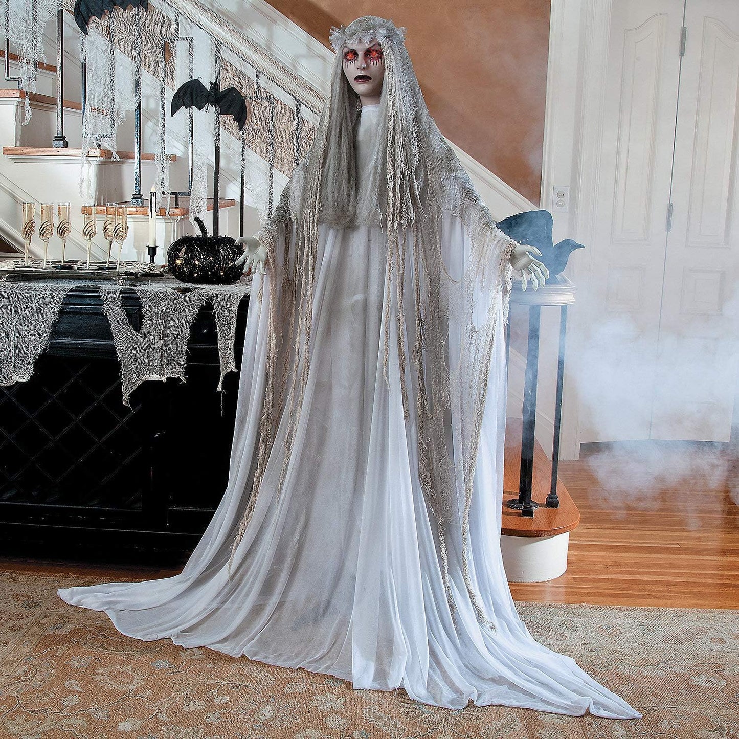 Fun Express Standing Ghost Girl Halloween Decoration, 5 feet 7 inch, Plastic and Metal, Flashing Red Eyes with Tatterered Gown, Great for Indoor, Outdoor and Porch Halloween Spooky Decor - White